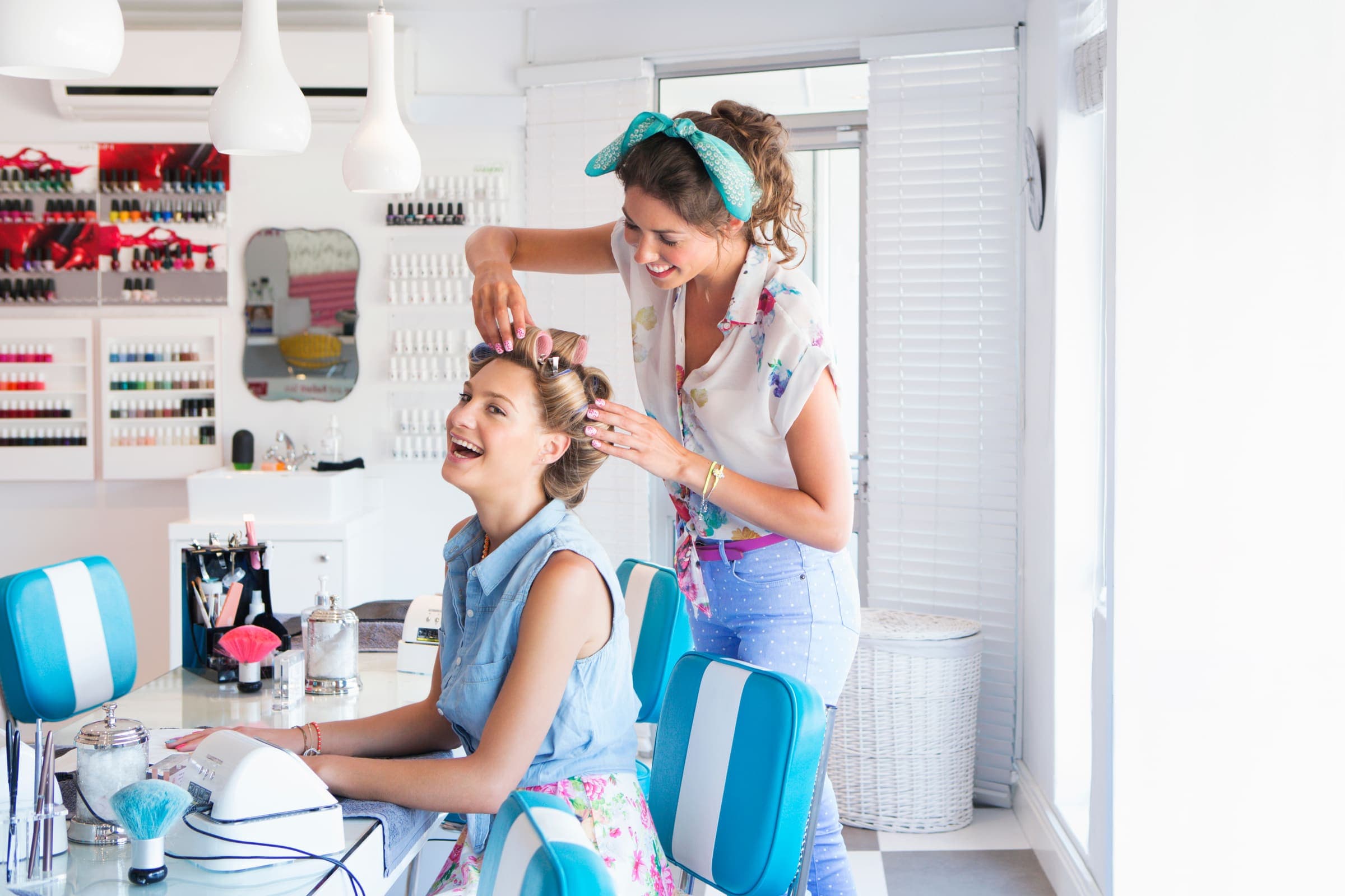 Client receiving hair styling at a professional salon